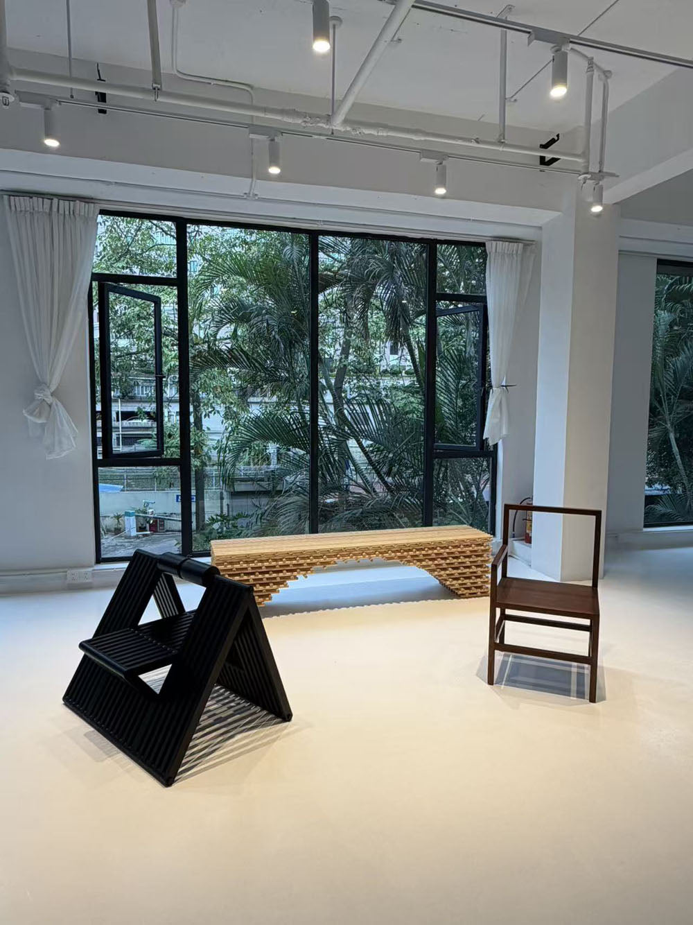 Bedroom with large windows and modern decor